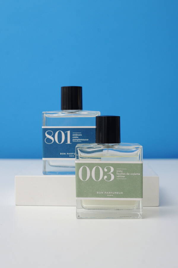 A styled image of Bon Parfumeur 003 and 801 Eau de Parfums.