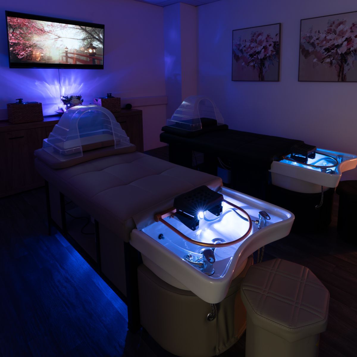 A dimly lit spa room with Japanese head spa beds.