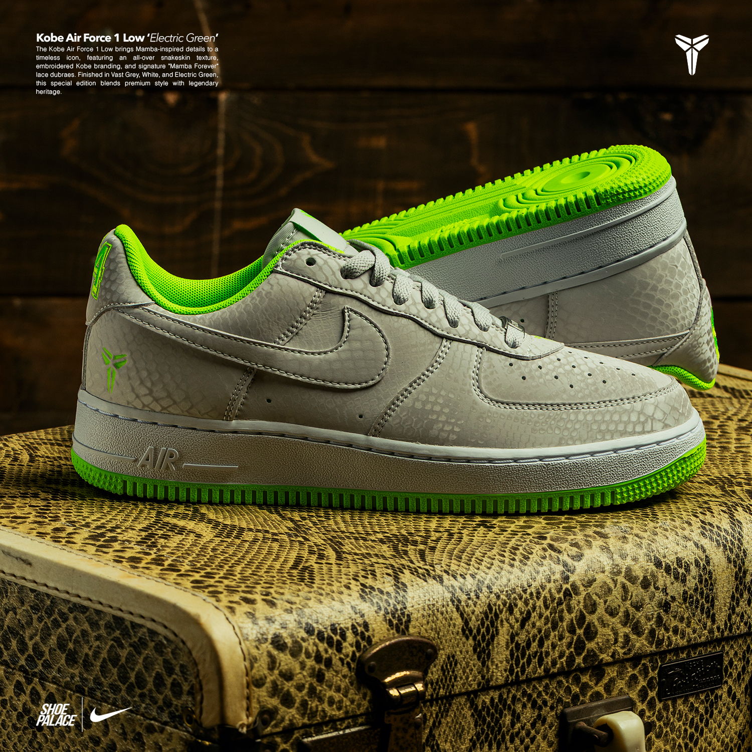 Nike Air Force 1 sneakers with grey and neon green accents on a textured background.