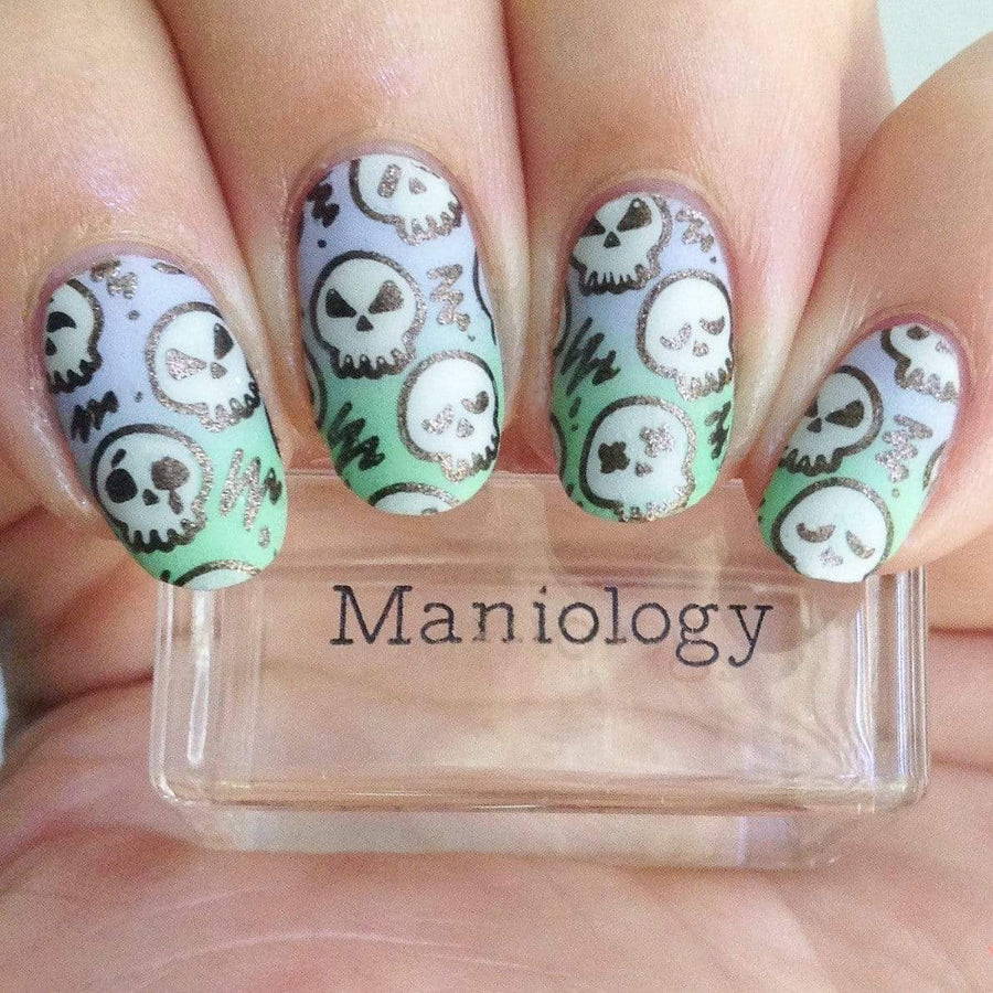 Halloween inspired nails like these require no nail stickers just creativity