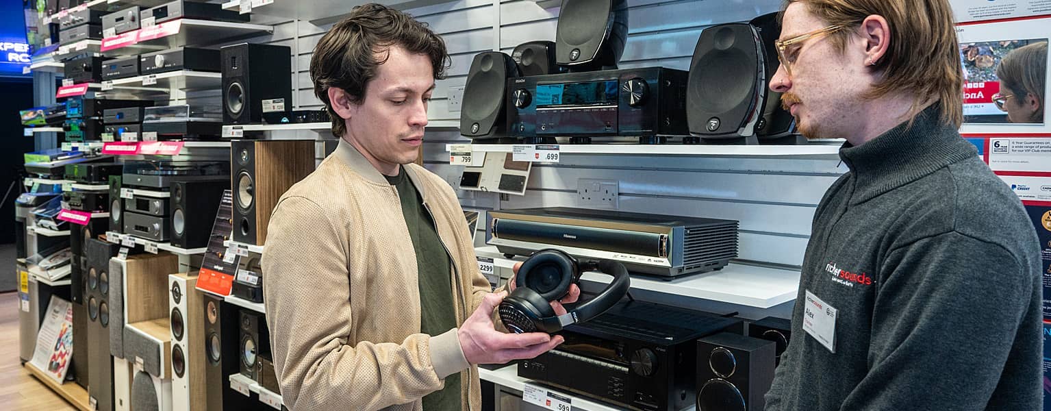 A customer looking at some headphones in one of our stores.