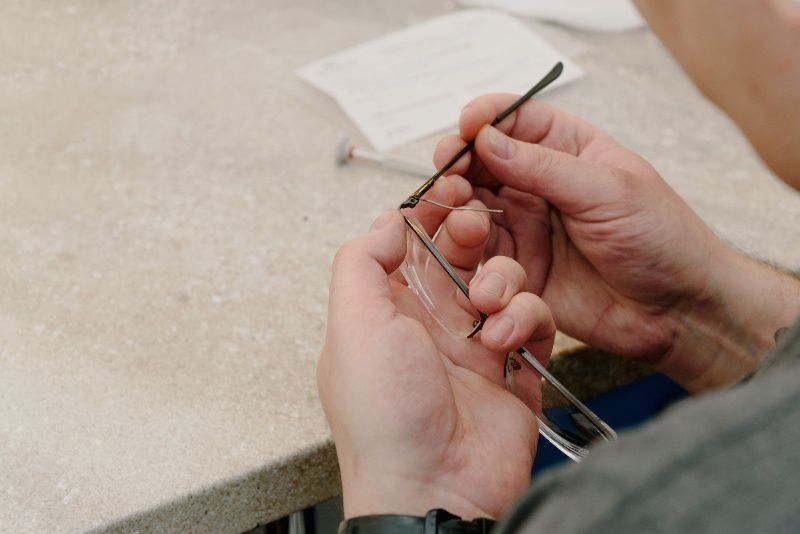 adjusting a metal eyeglasses frame