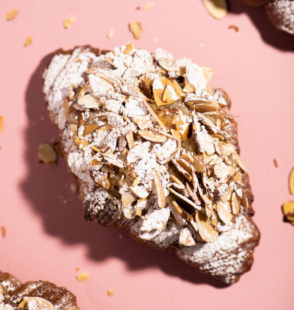 vegan split bakehouse almond croissant with almonds and powedered sugar