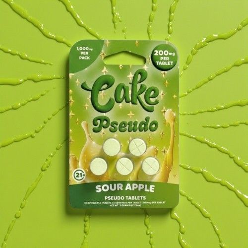 Packaging for Cake Pseudo sour apple flavored candy on a green background.