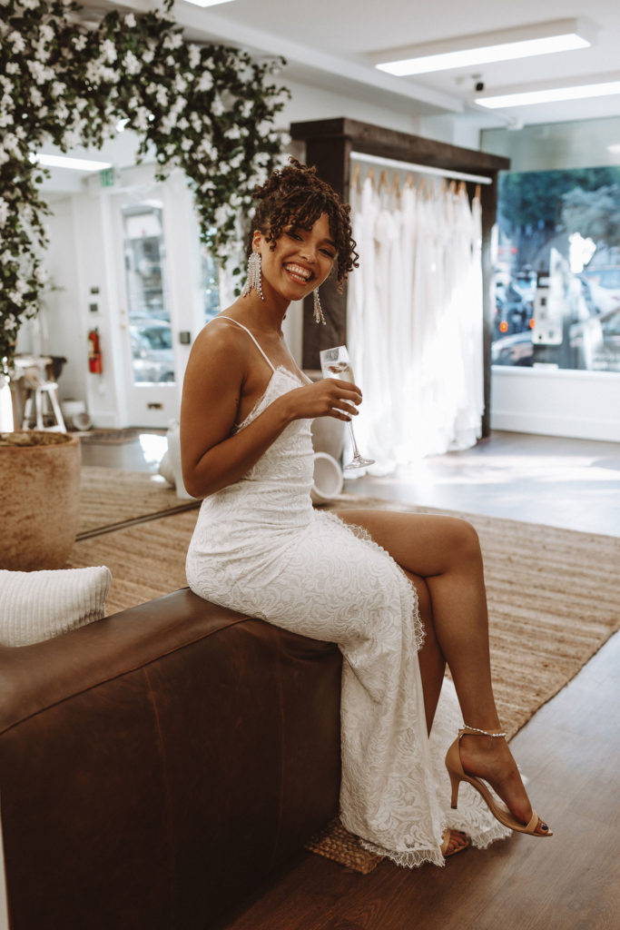 Women in San Francisco bridal showroom wearing the Dosa heel in sand 