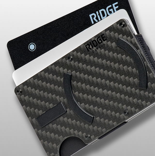 A sleek carbon fiber wallet with the logo 