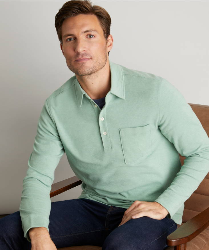 Model is wearing UNTUCKit Agrill polo in granite green.