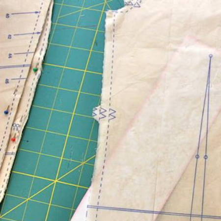 Thin yellowish pattern paper on a pattern with markings