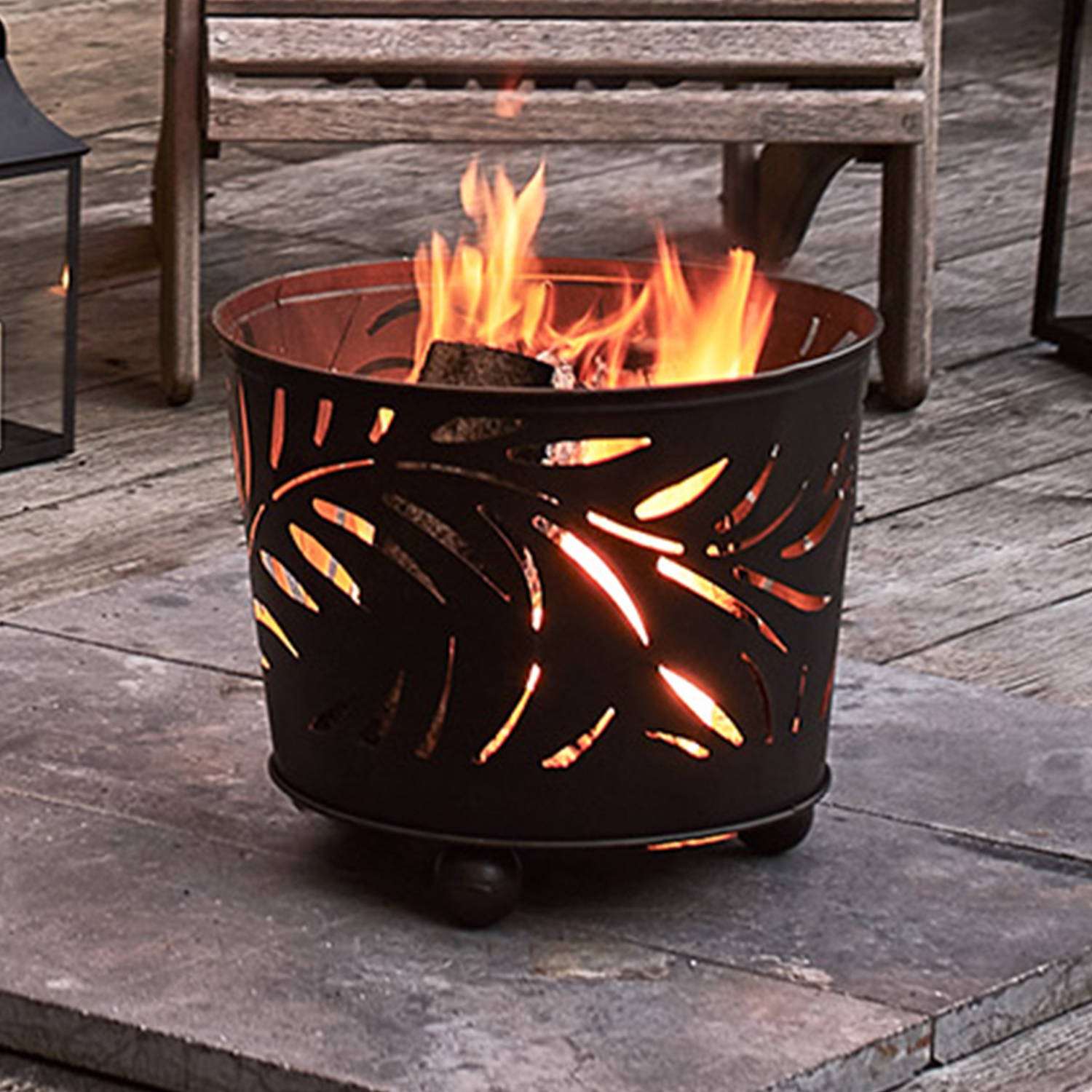 Outdoor firepit on a stone floor