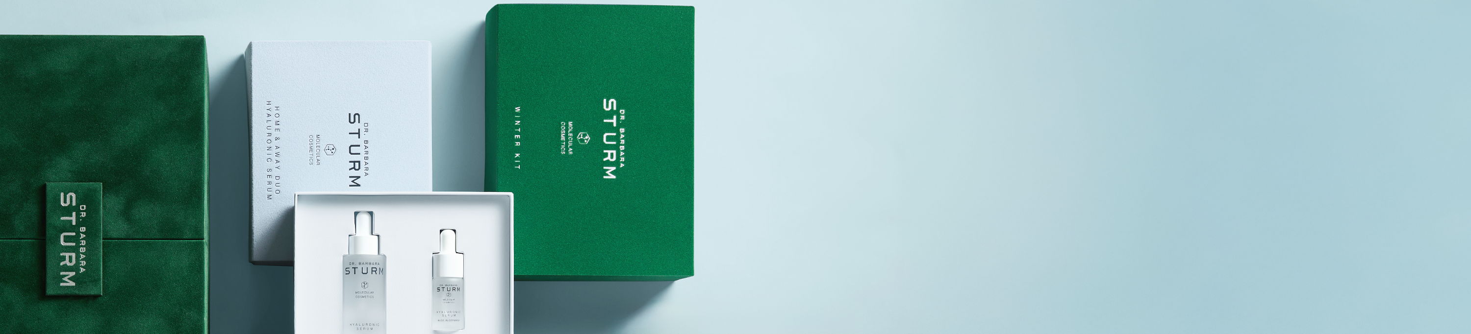 Product packaging in green and white against a light background.