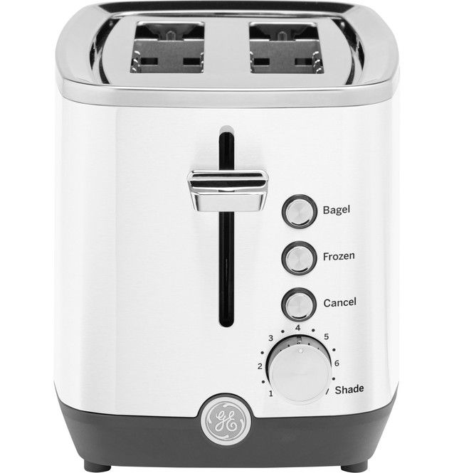 White toaster with multiple settings and slots for bread.