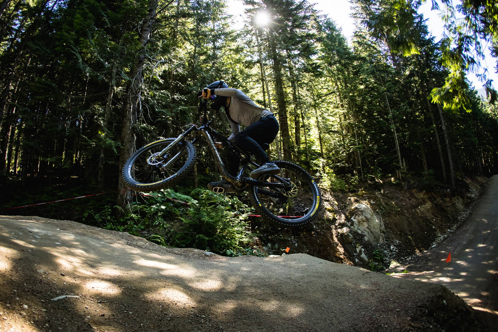 A Nukeproof rider on a Giga at Whistler bike park