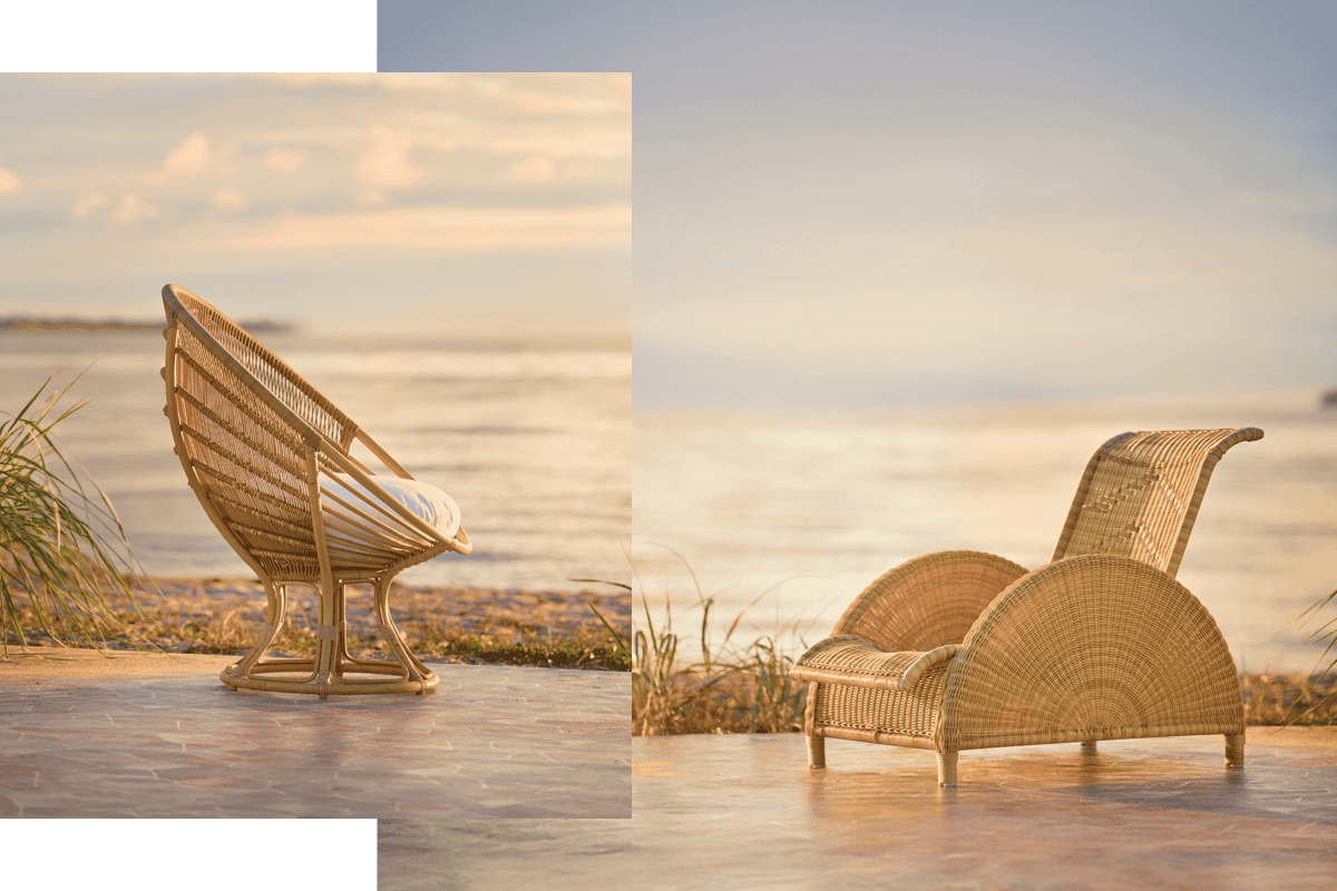Sculptural woven outdoor lounge chairs with rattan-look frames styled beside the water at sunset.