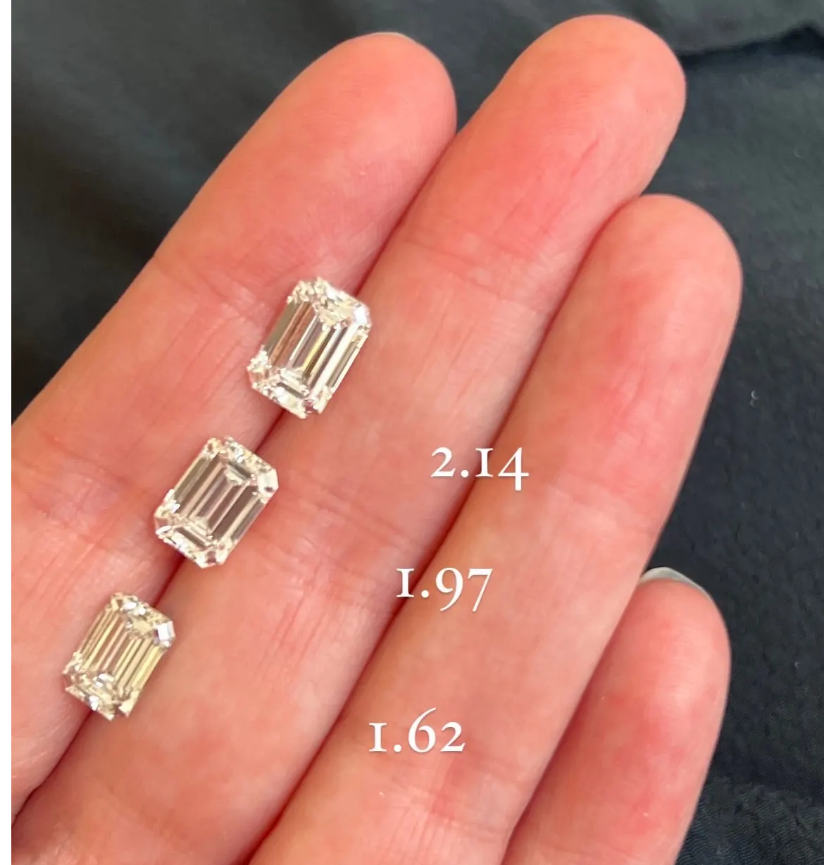 emerald cut diamond carat sizes on a hand