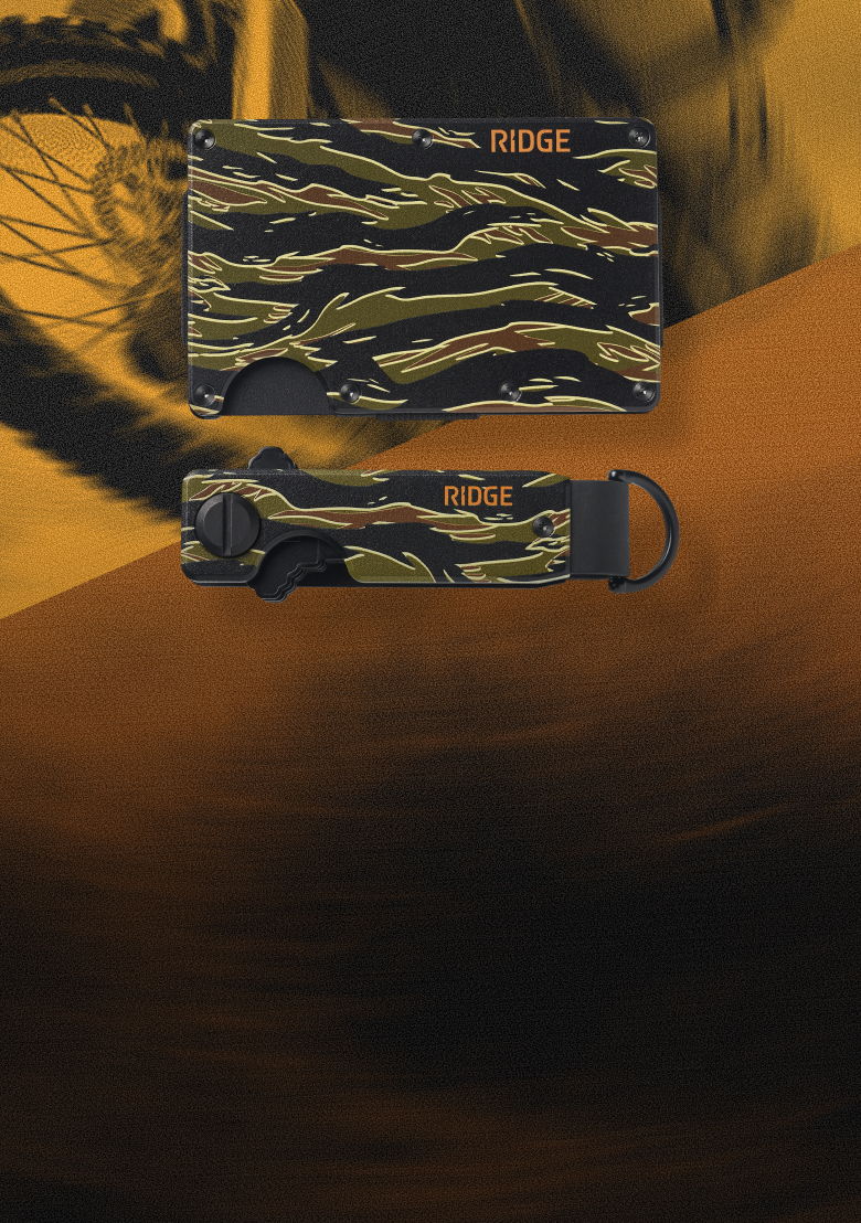 Ridge wallet and tool in camouflage design on an artistic background.