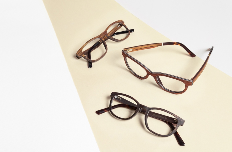 flat lay photo of Kraywoods eyeglasses for round faces on a white and tan background