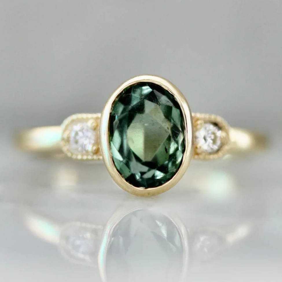 green oval cut tourmaline ring