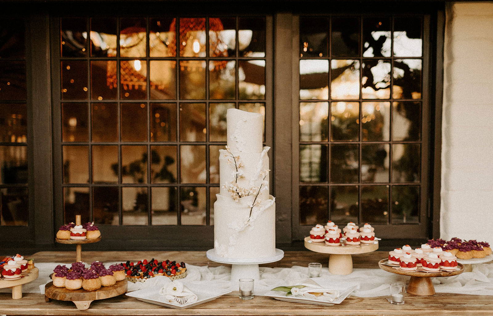 Wedding cake on wooden table