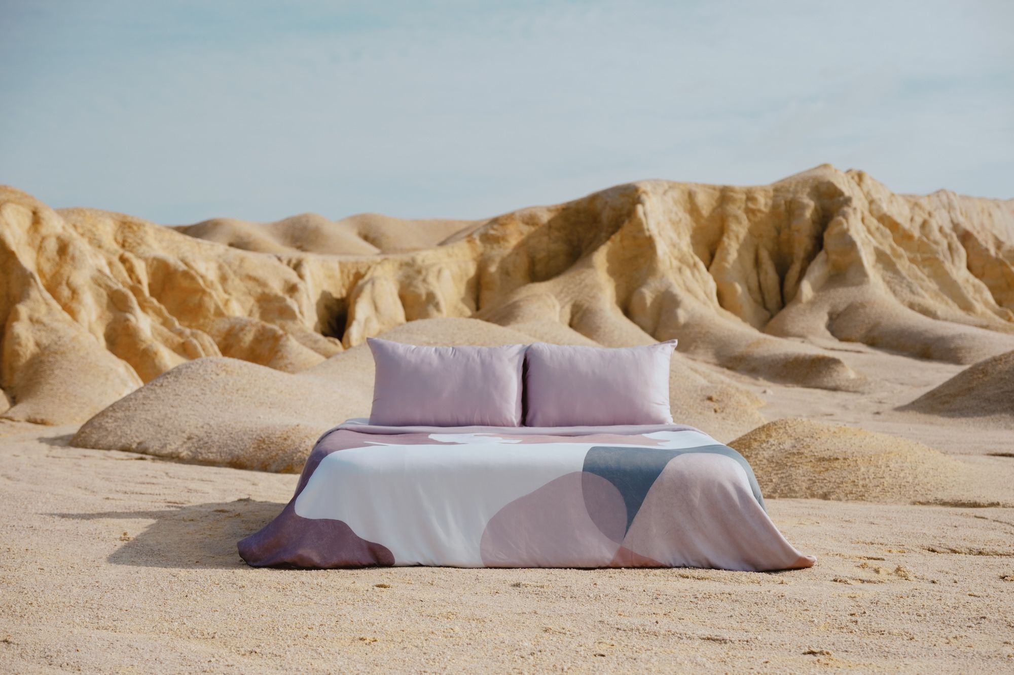 Printed bamboo bedsheets in a desert landscape