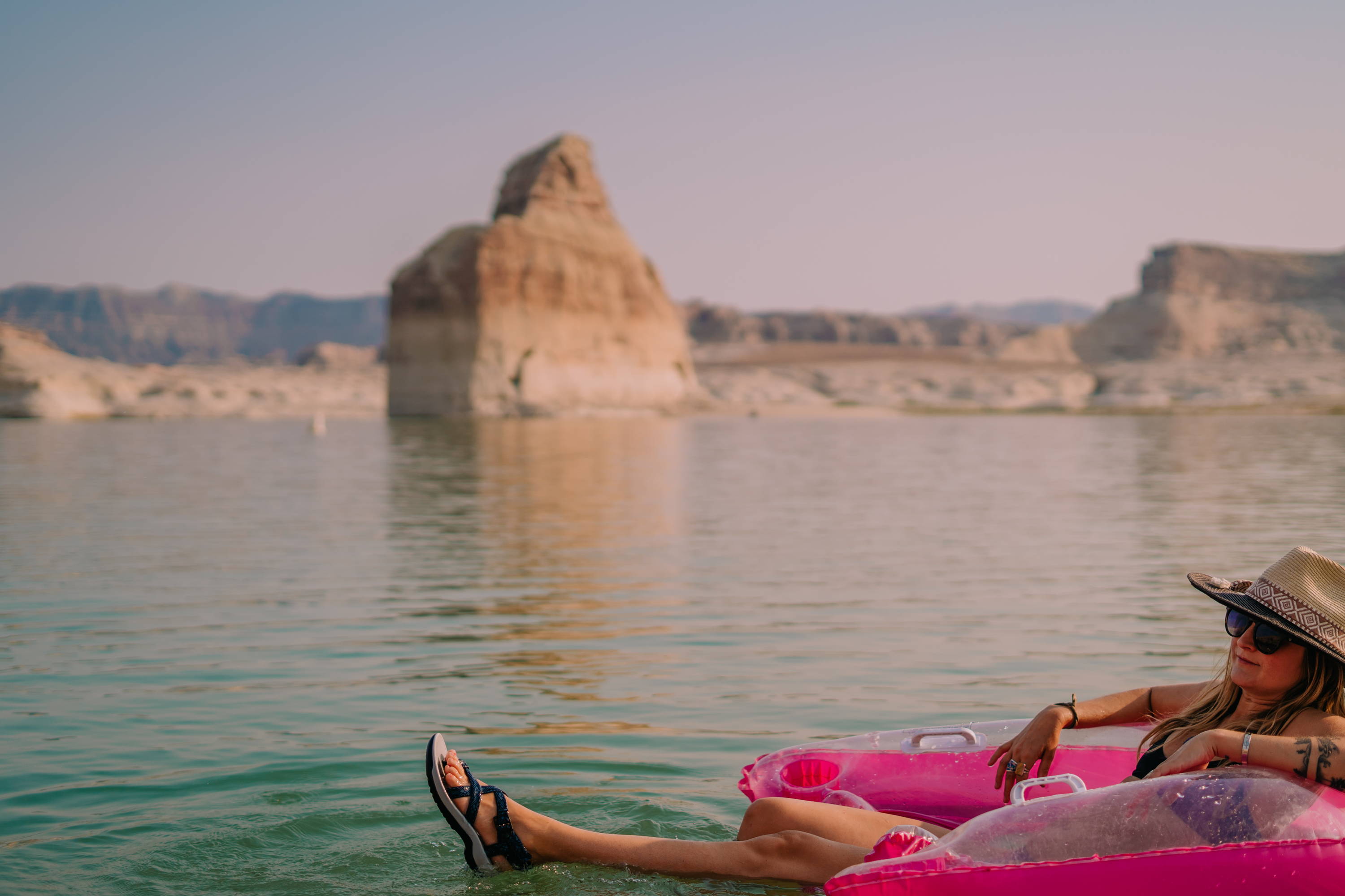 woman floating in water shoes