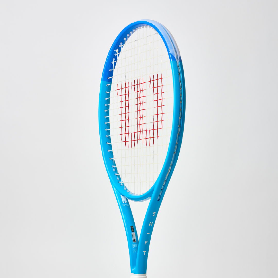 A blue tennis racket with a red and white string pattern.