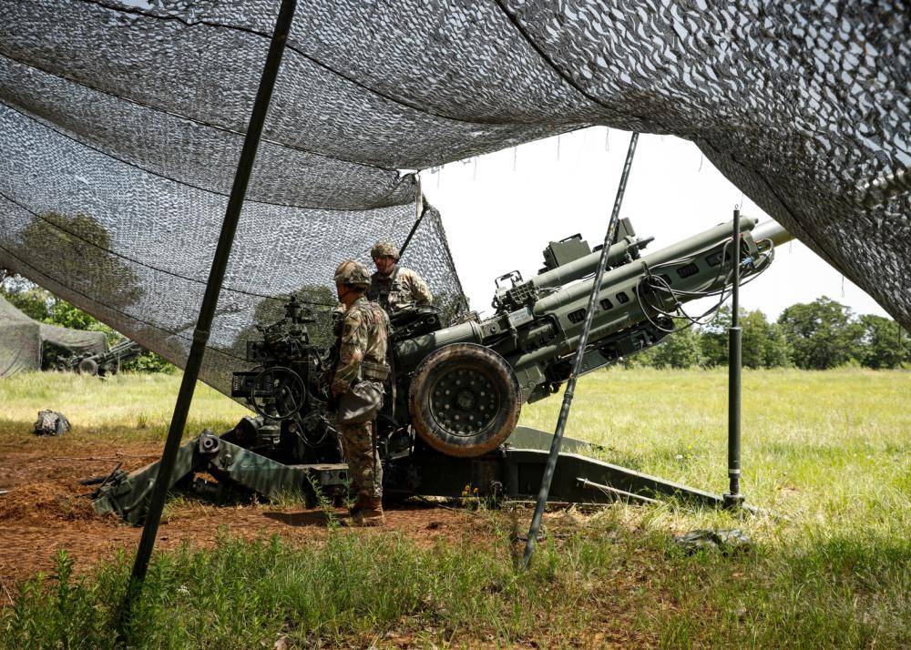 Arkansas National Guard soldiers from Charlie Battery of 1st Battalion, 206th Field Artillery Regiment conduct training with the M777 Howitzer during Annual Training on Fort Chaffee June 11, 2022.