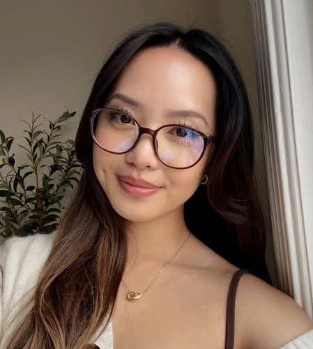 asian woman wearing Serene Brown oval low bridge glasses