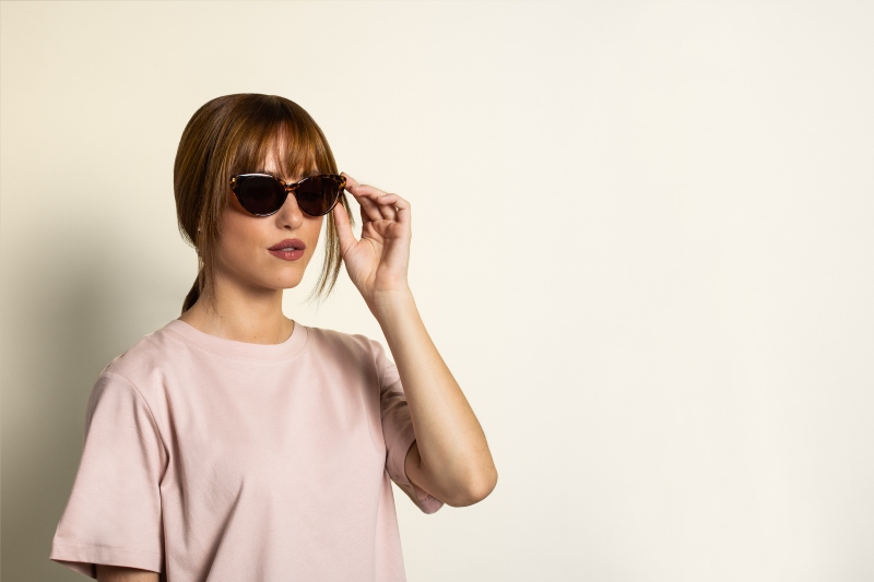woman with diamond face shape wearing Kraywoods cat eye sunglasses