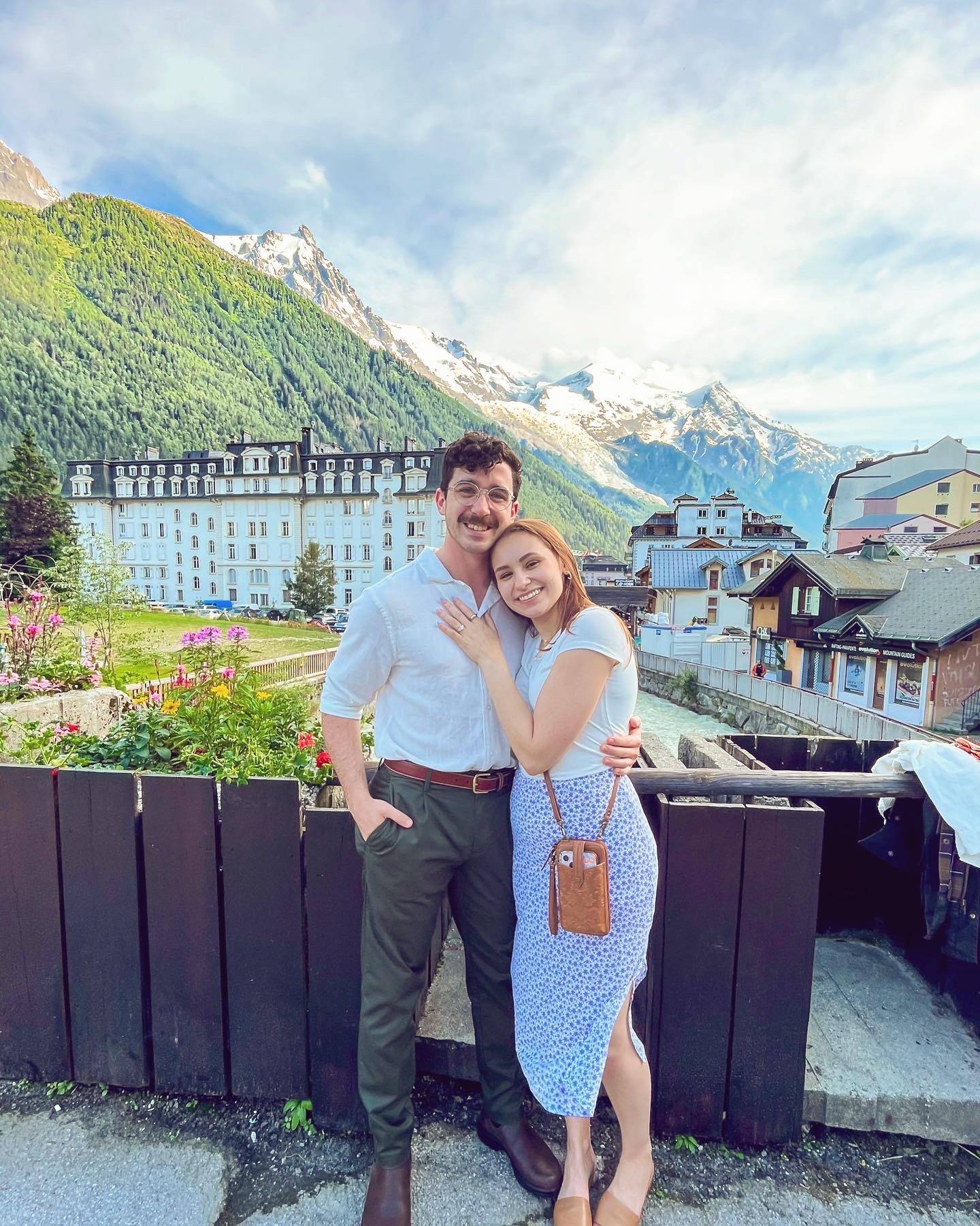 Dan and Mackenzie in Switzerland with mountains in the backgound