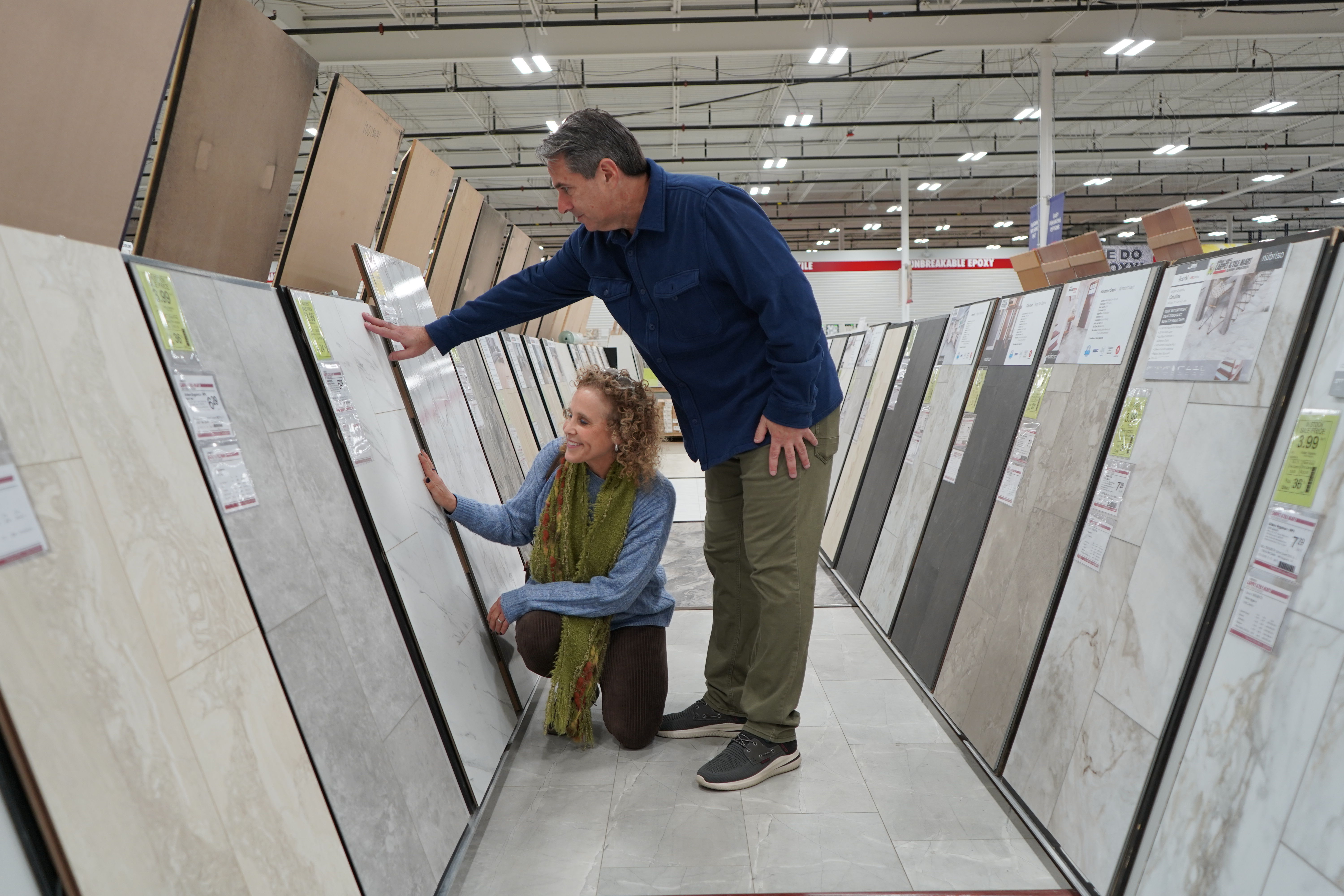 couple looking at flooring options