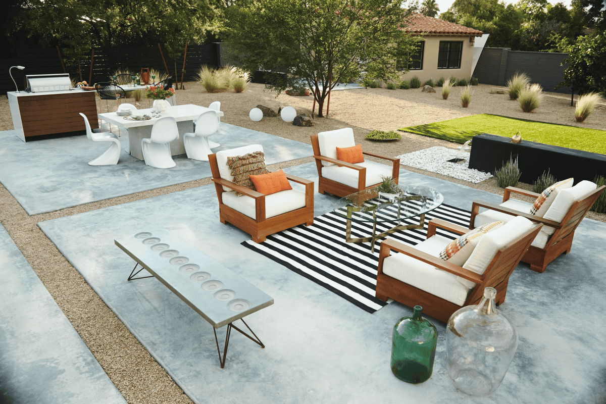 Arizona outdoor living layout with concrete pads, lounge seating, outdoor dining area, and built-in grill island.