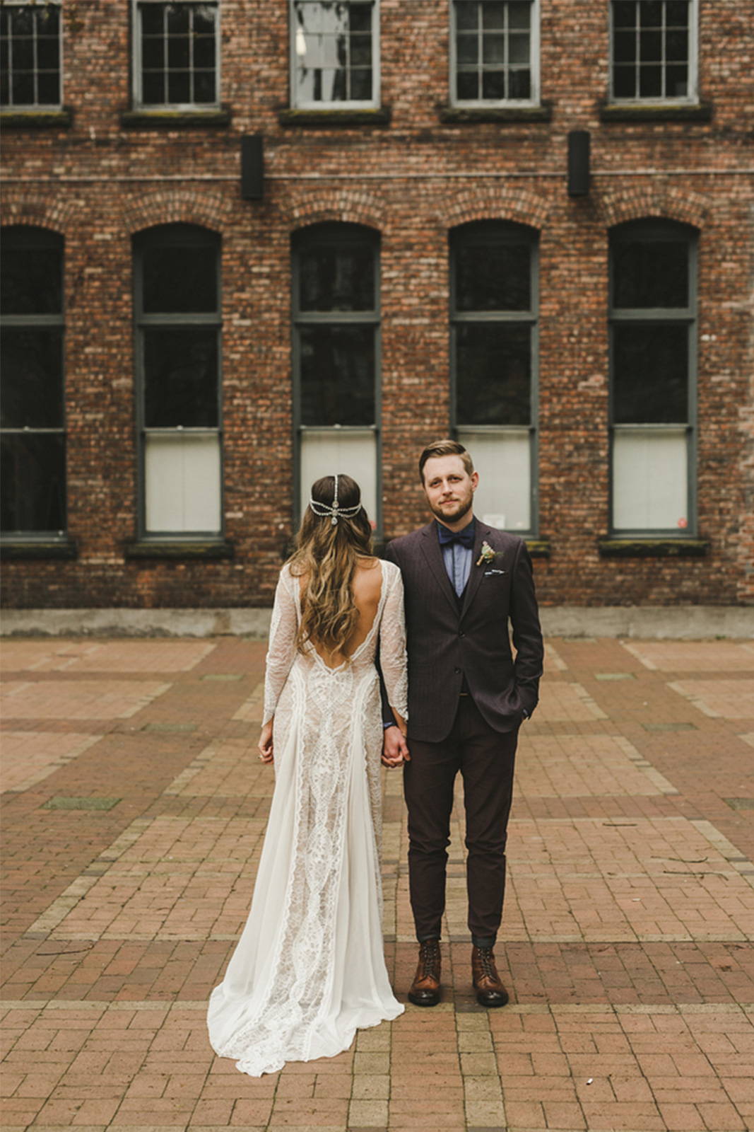 Bride and groom photos outside building 