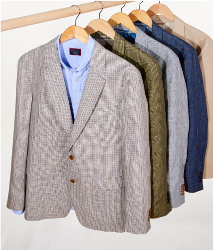Collection of UNTUCKit sport coats.
