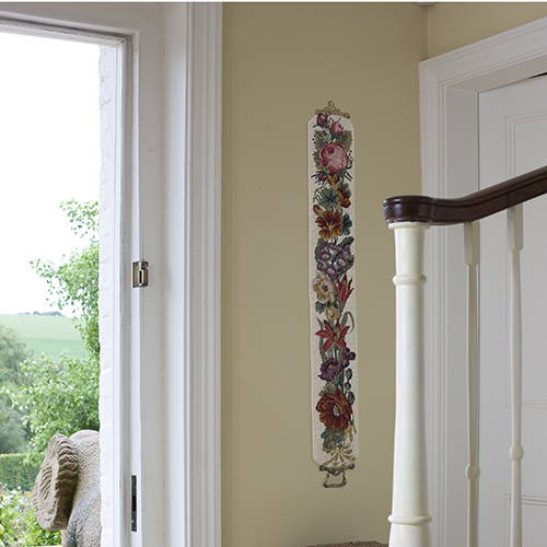Victorian Flowers bell pull with cream background handing on wall