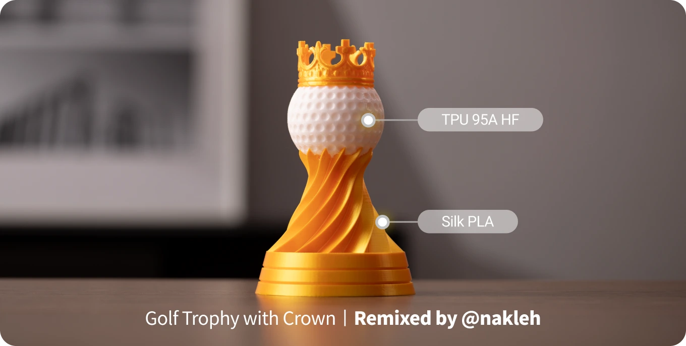 Golf trophy with a crown, featuring a golf ball design.