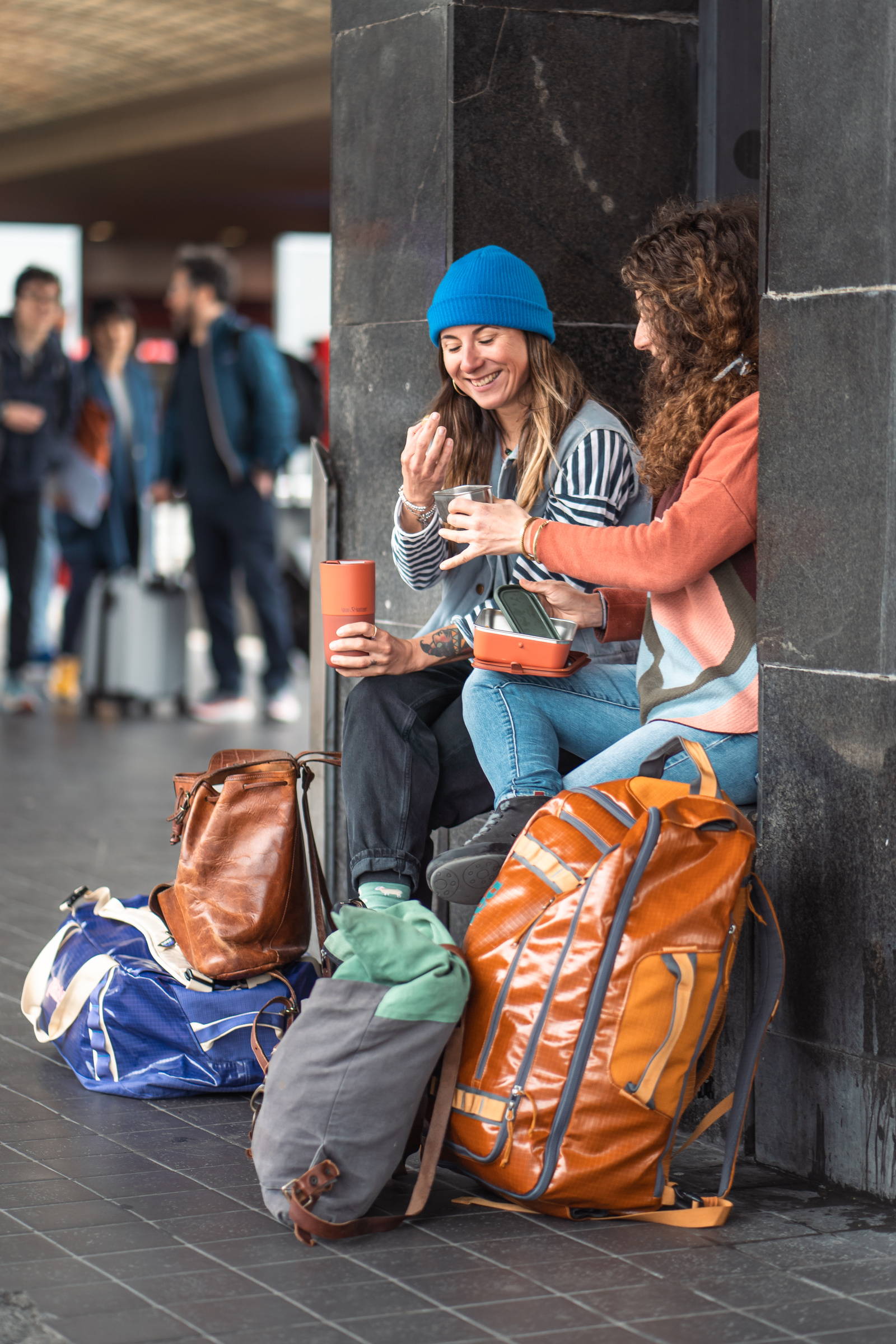 Women travelling with food box