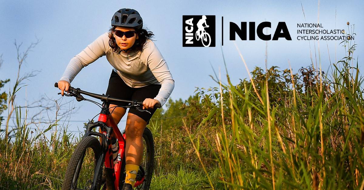 NICA girl mountain biker wearing Rudy Project helmet and sunglasses