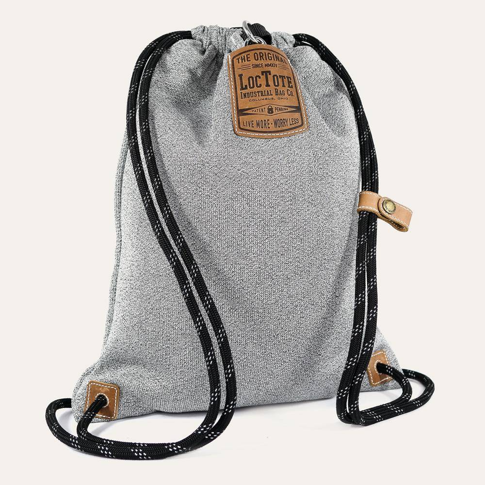 light grey lockable drawstring backpack with slash-proof straps