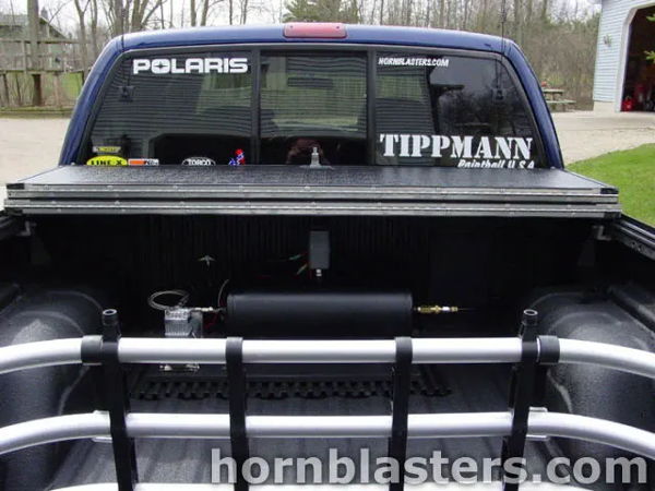 Truck bed view showing the air tank and compressor setup installed behind the cab in Kevin's 2002 Chevrolet S10, install photo 2