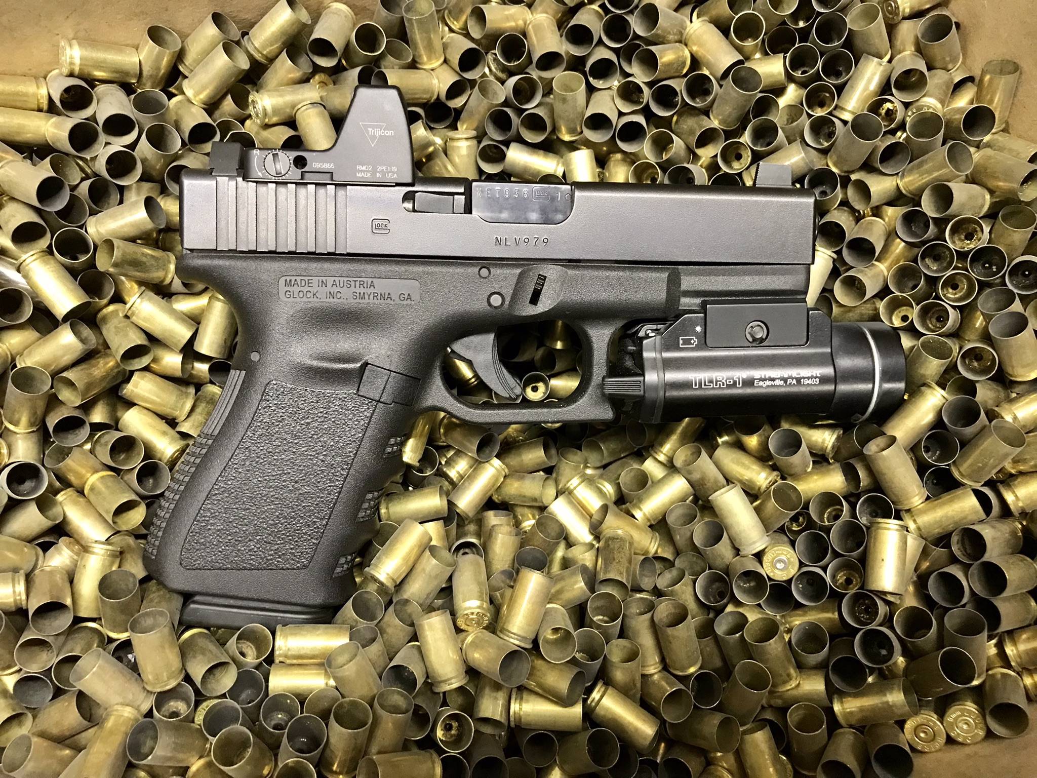 Glock 19 with Trijicon RMR red dot sight.