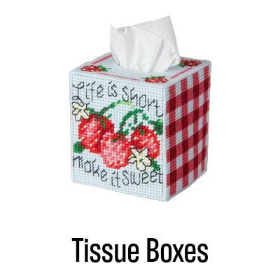 Tissue Boxes. Image: Herrschners Life is Sweet Tissue Box Plastic Canvas Kit.
