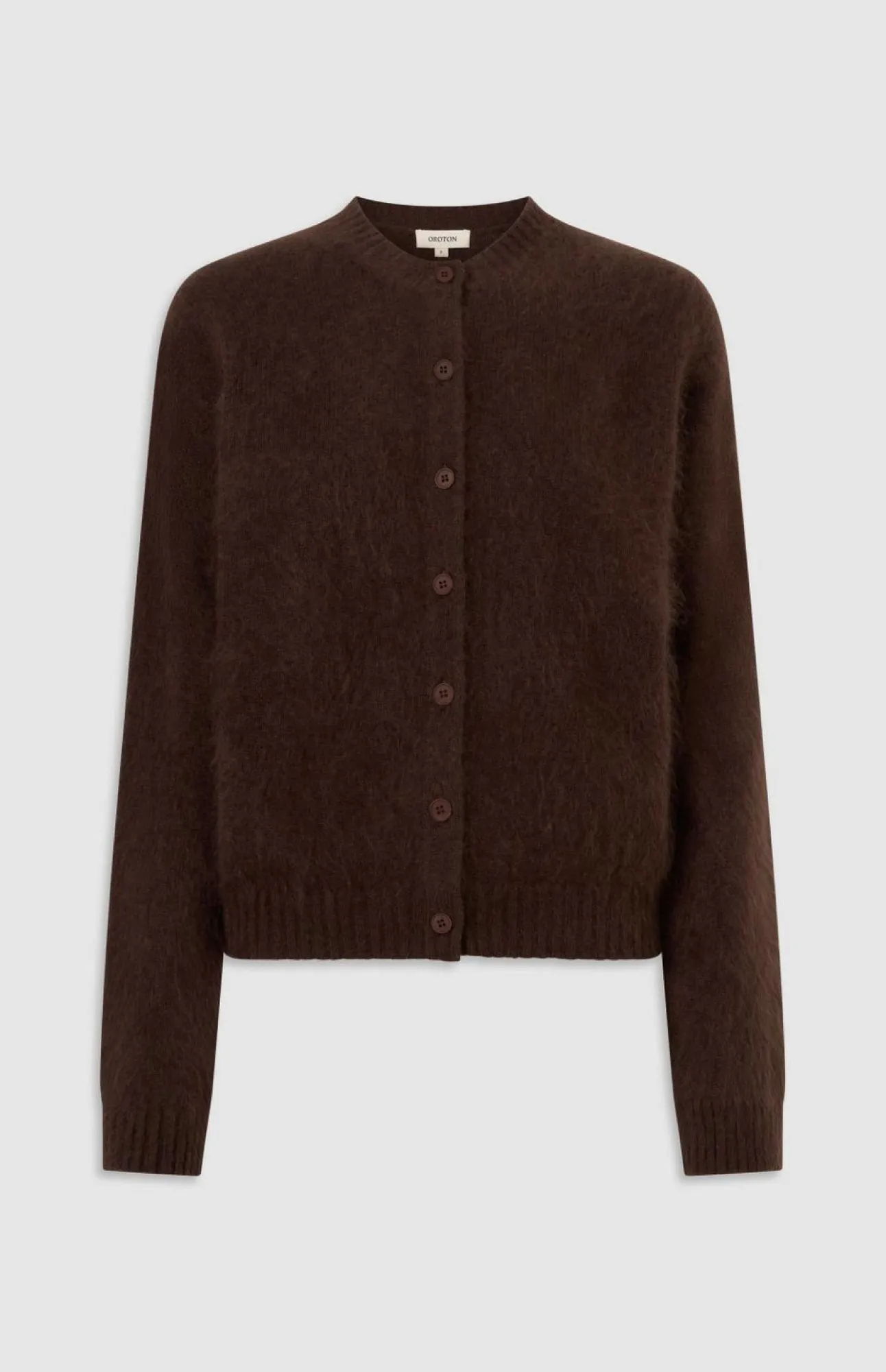 Brown cardigan with a round neckline and button closure.