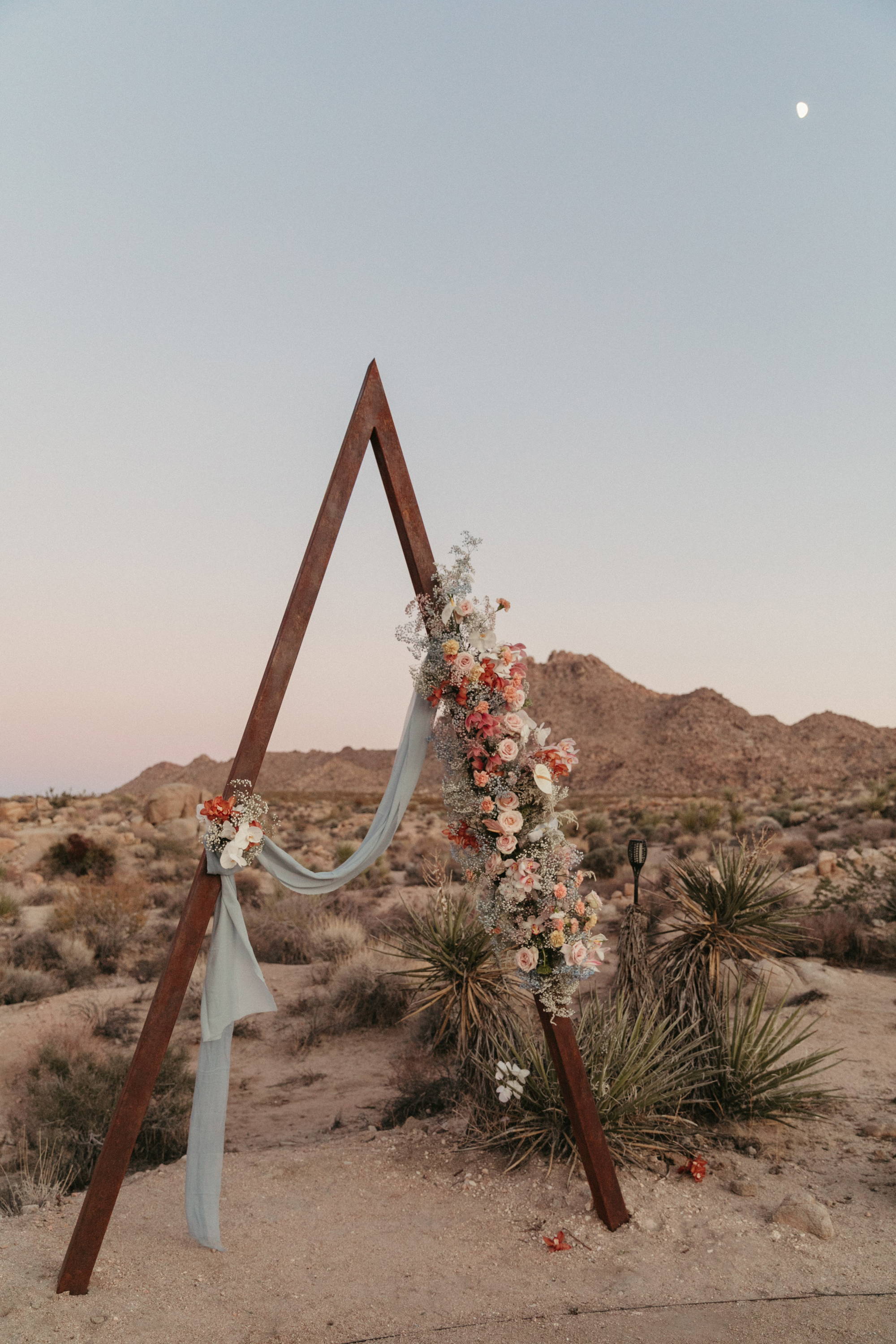 Wooden triangle arbor at dusk