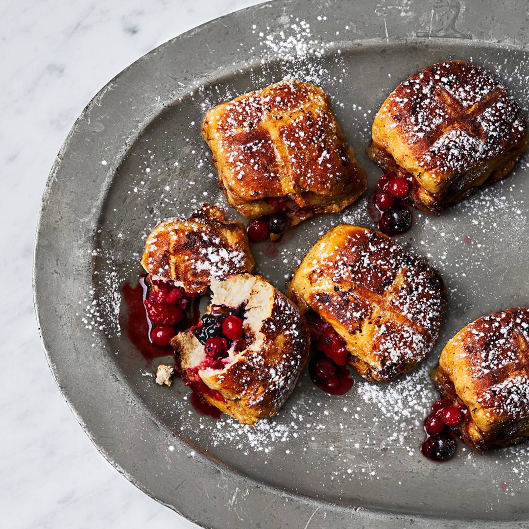 Hot cross bun French toast on a plate.