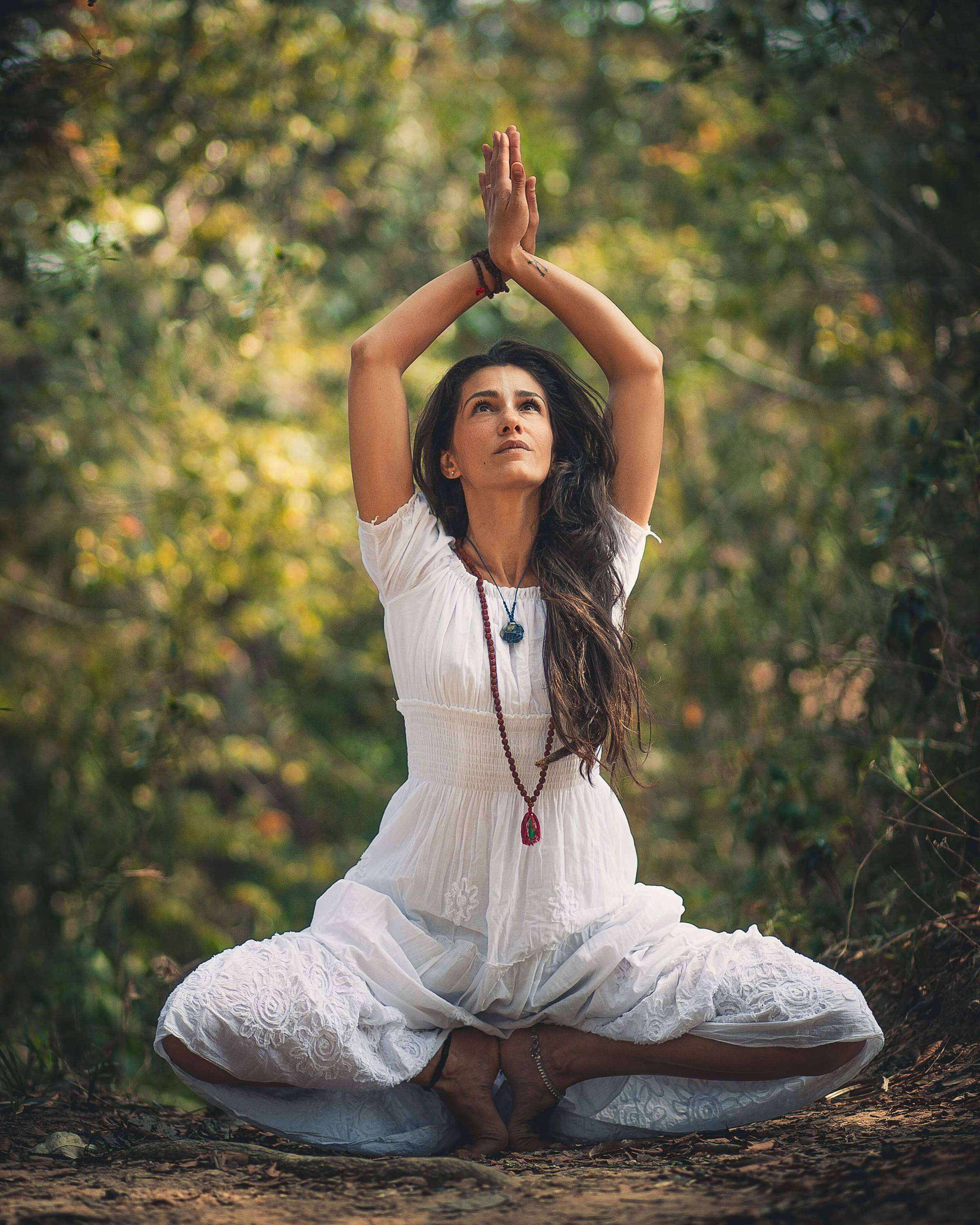 woman doing yoga with nature