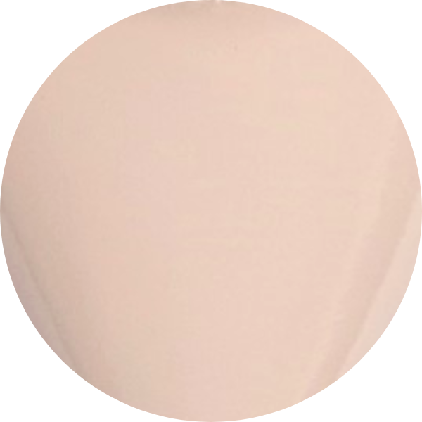 Round, light peach-colored object with a smooth surface.