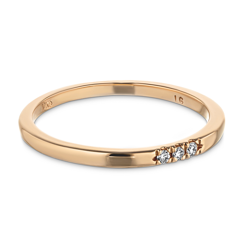 Rose gold band with three diamonds inlayed