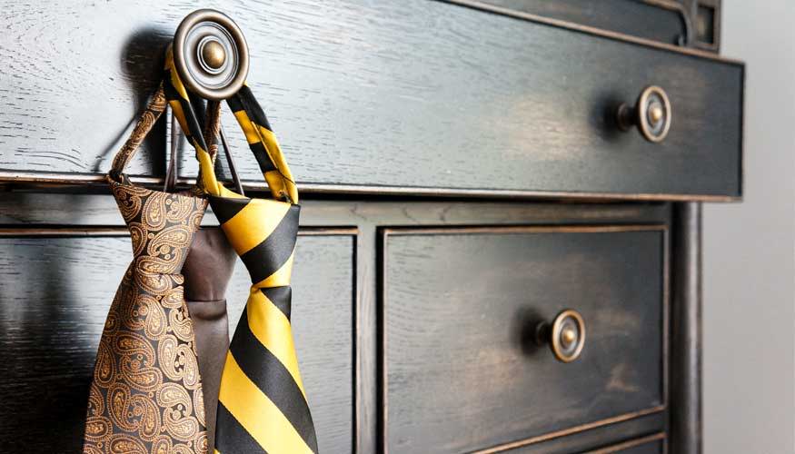 Pre-tied zipper ties hanging from a dresser