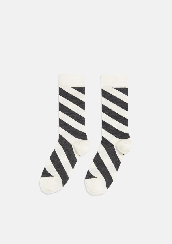 Product image of Bellerose Bhol Socks Natural. A pair of sock in cream with bold, dark grey diagonal stripes.