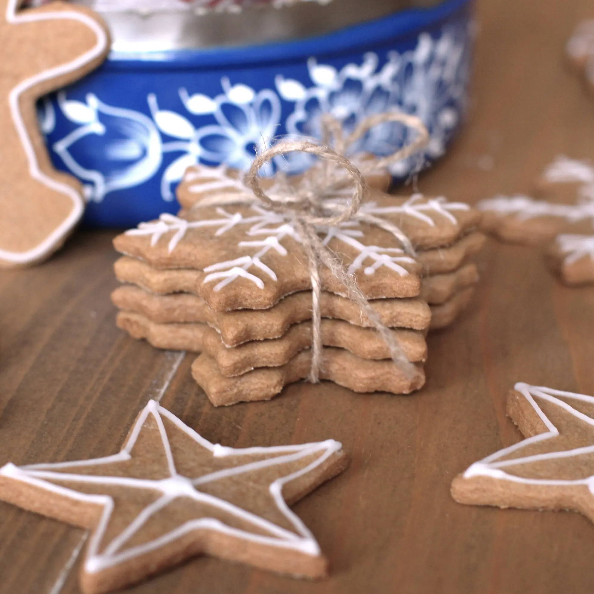 A festive biscuit bundle tied with twine on a kitchen worktop